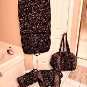 Great buy!!! ALL 4 Vera Bradley Ming travel set.